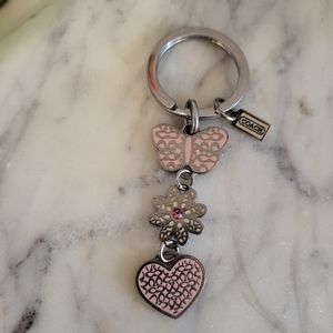Coach keychain with Heart, daisy, and butterfly